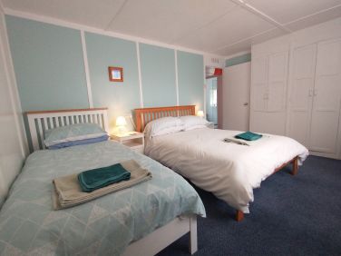 Family room - 1 double and 1 single bed, lots of storage