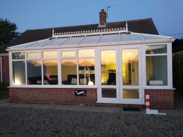 Sunset reflected on the conservatory, perfect place to spend a lazy evening
