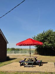Patio picnic table with views towards to Happisburgh over the fields