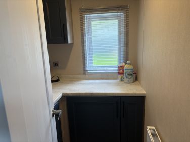 Separate utility room with lots of extra storage