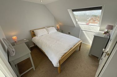 Master bedroom with king size bed on 2nd floor