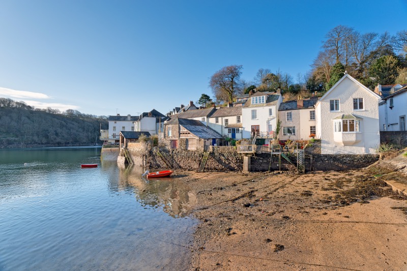 Painted cottages beside the water