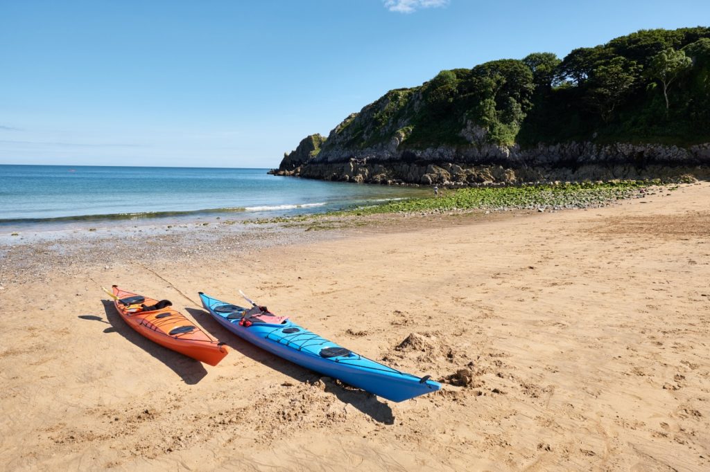 Two kayaks on the sandy beach