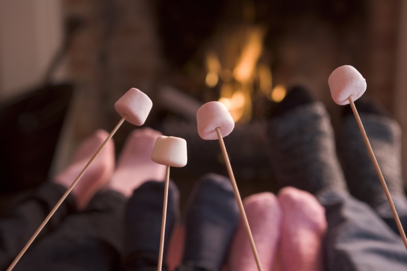 Marshmallows toasting on the fire