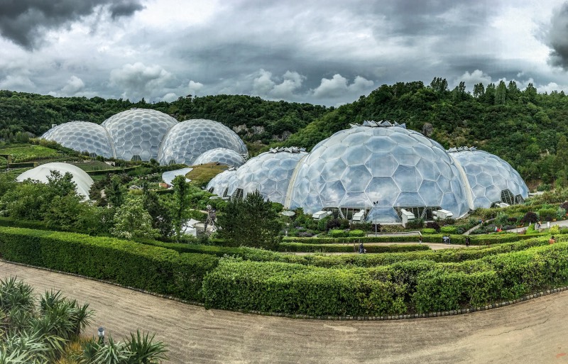 Biodomes surrounded by lush greenery of the Eden Project
