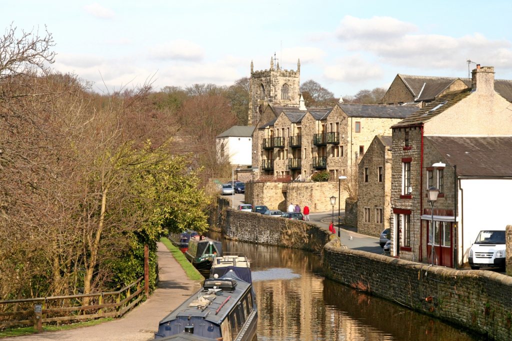 Skipton and the canal with boats on the water