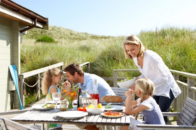 Family alfresco dining outside