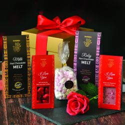 For serious chocolate lovers, Suffolk-based chococolatiers <i>Marimba</i> have kindly provided their gold presentation box including indulgent hot chocolate and heart-shaped treats.