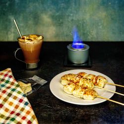 Cosy-up and toast marshmallows over a flickering flame with this <i>Grown Up Marshmallows</i> kit from Exmoor.